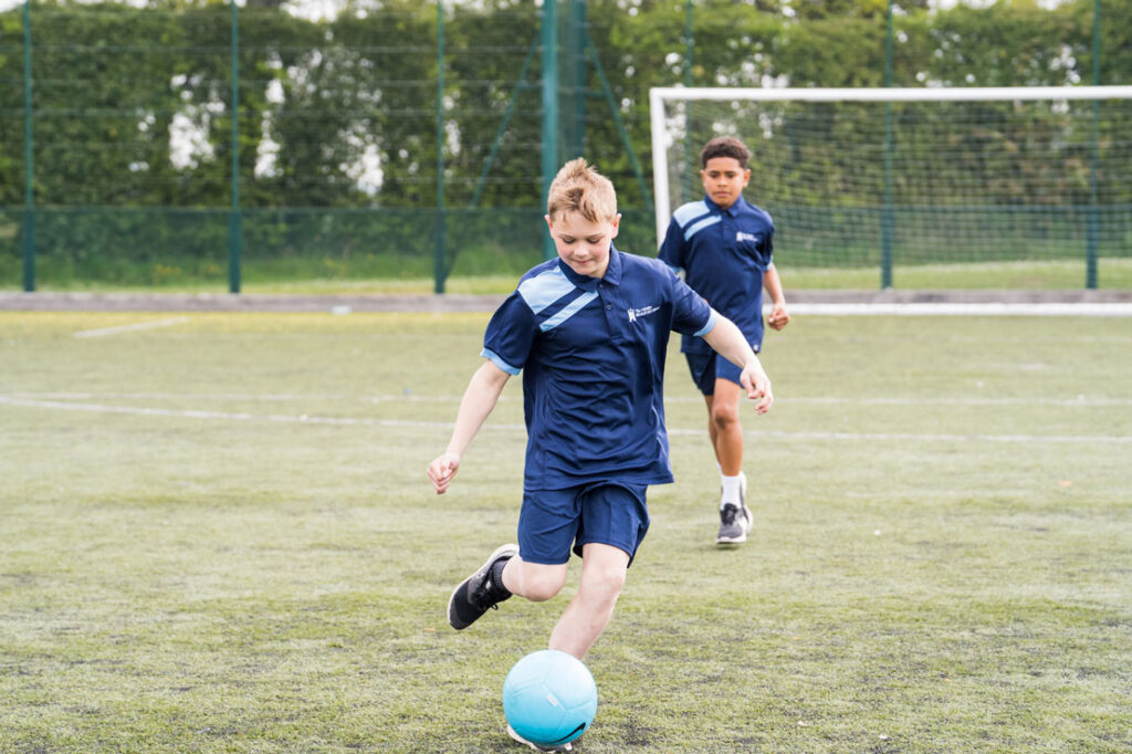 Student playing football
